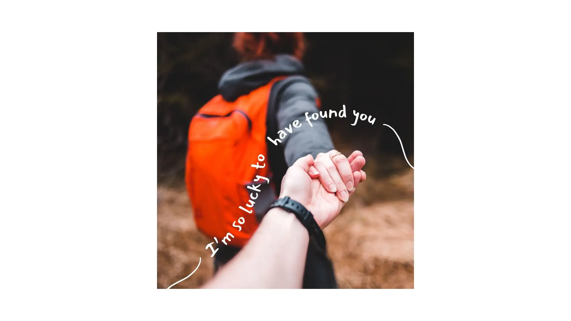 A hand grips a backpack featuring the phrase "Iâm so lucky to have found you" prominently displayed on its surface.