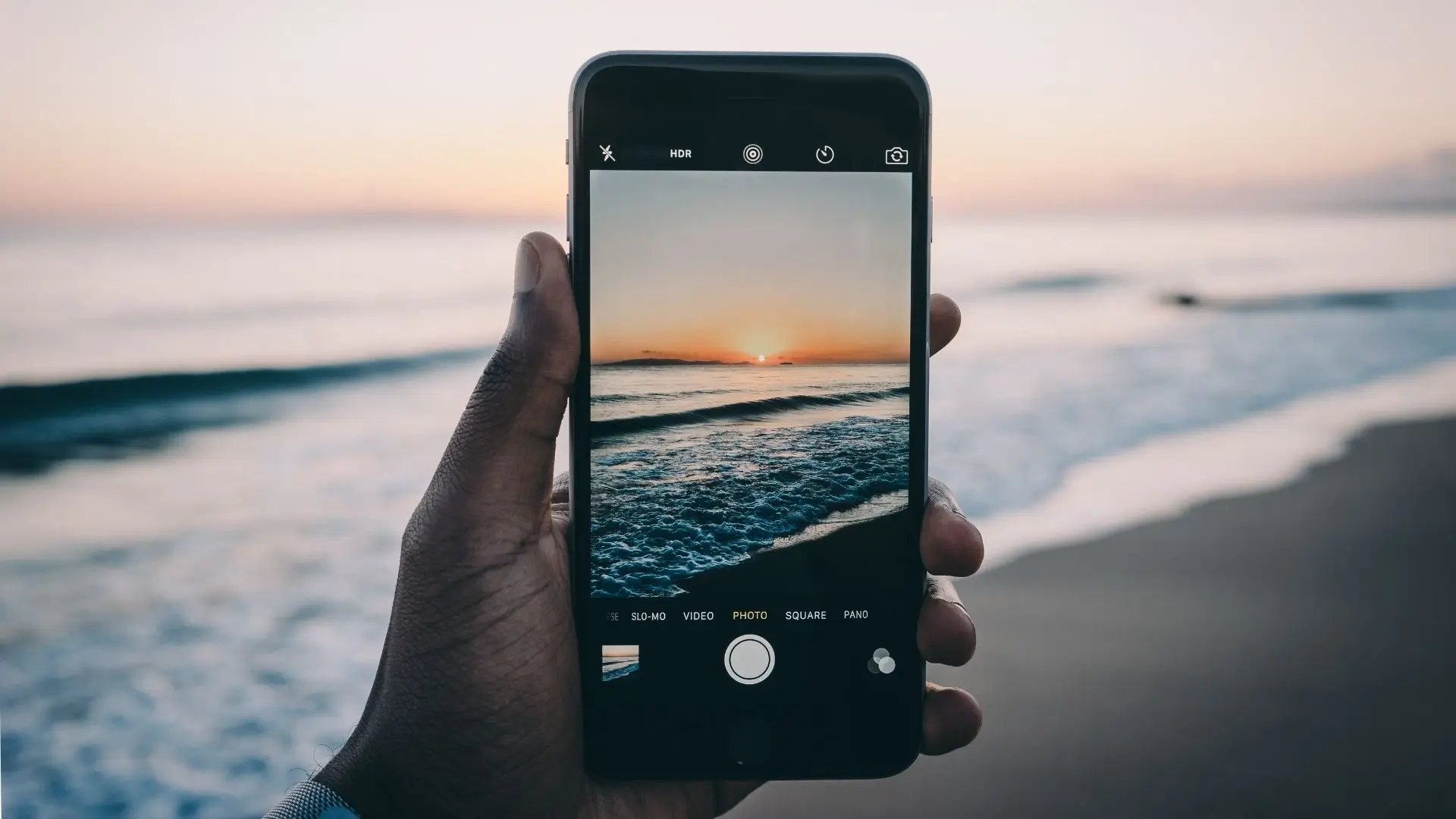 A serene sunset over the horizon, showcasing vibrant colors and ideal photography techniques for capturing the moment.