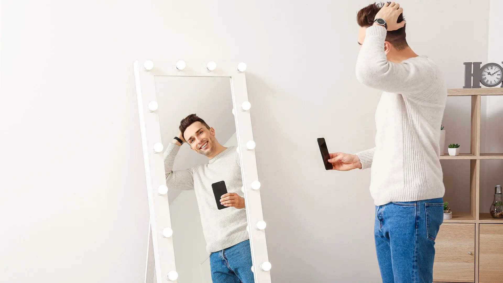 A man gazes at his reflection in a mirror, contemplating his appearance and thoughts.