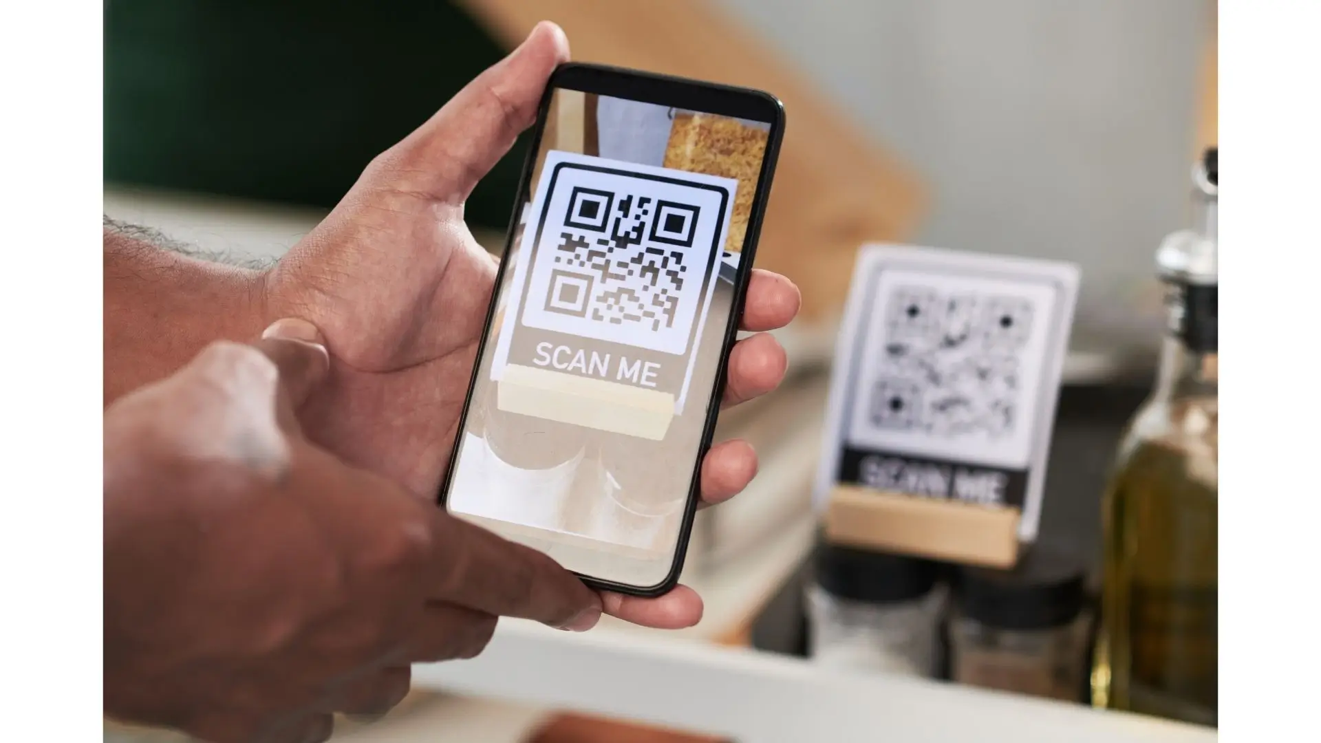 A person scanning a QR code with a smartphone, demonstrating mobile technology in action.