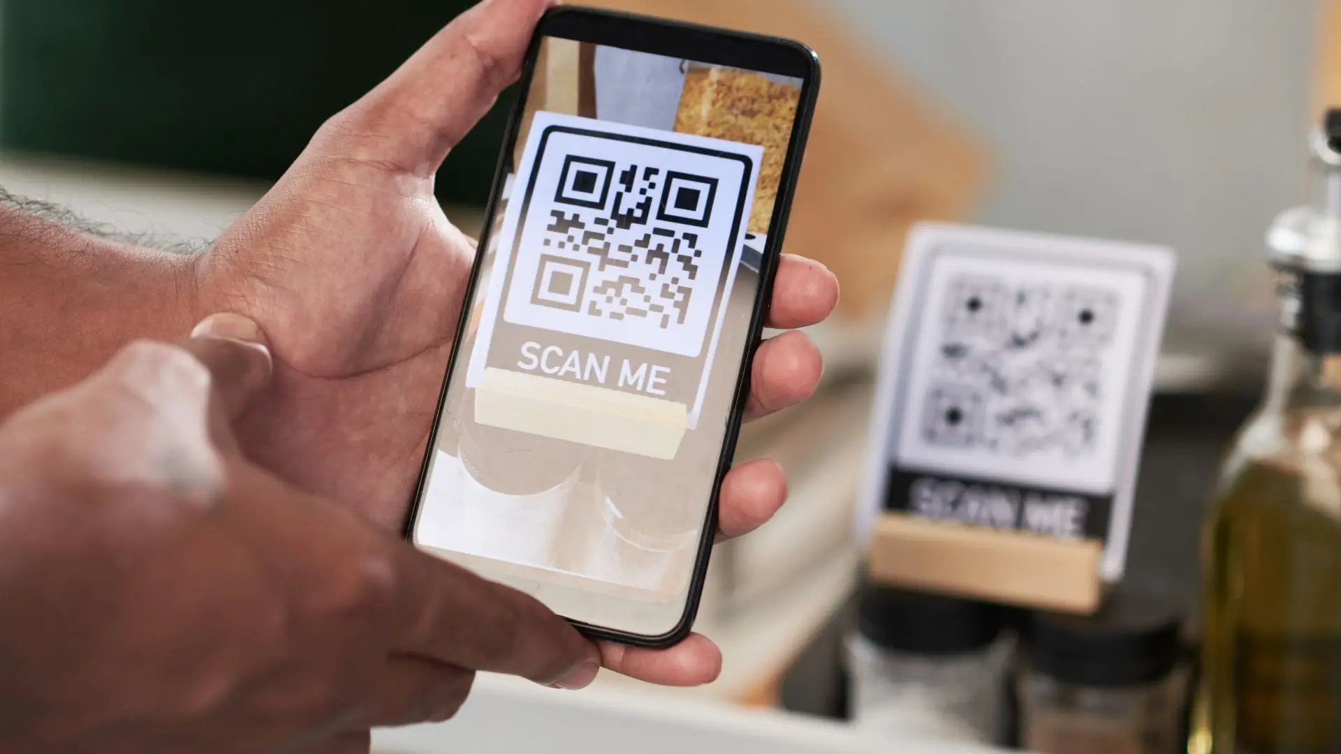 A person scanning a QR code with a smartphone, demonstrating modern technology in everyday use.